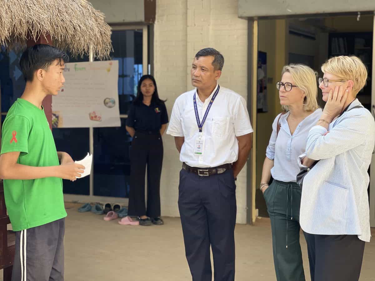 TDSO Teacher engaging with students during community outreach programme.
