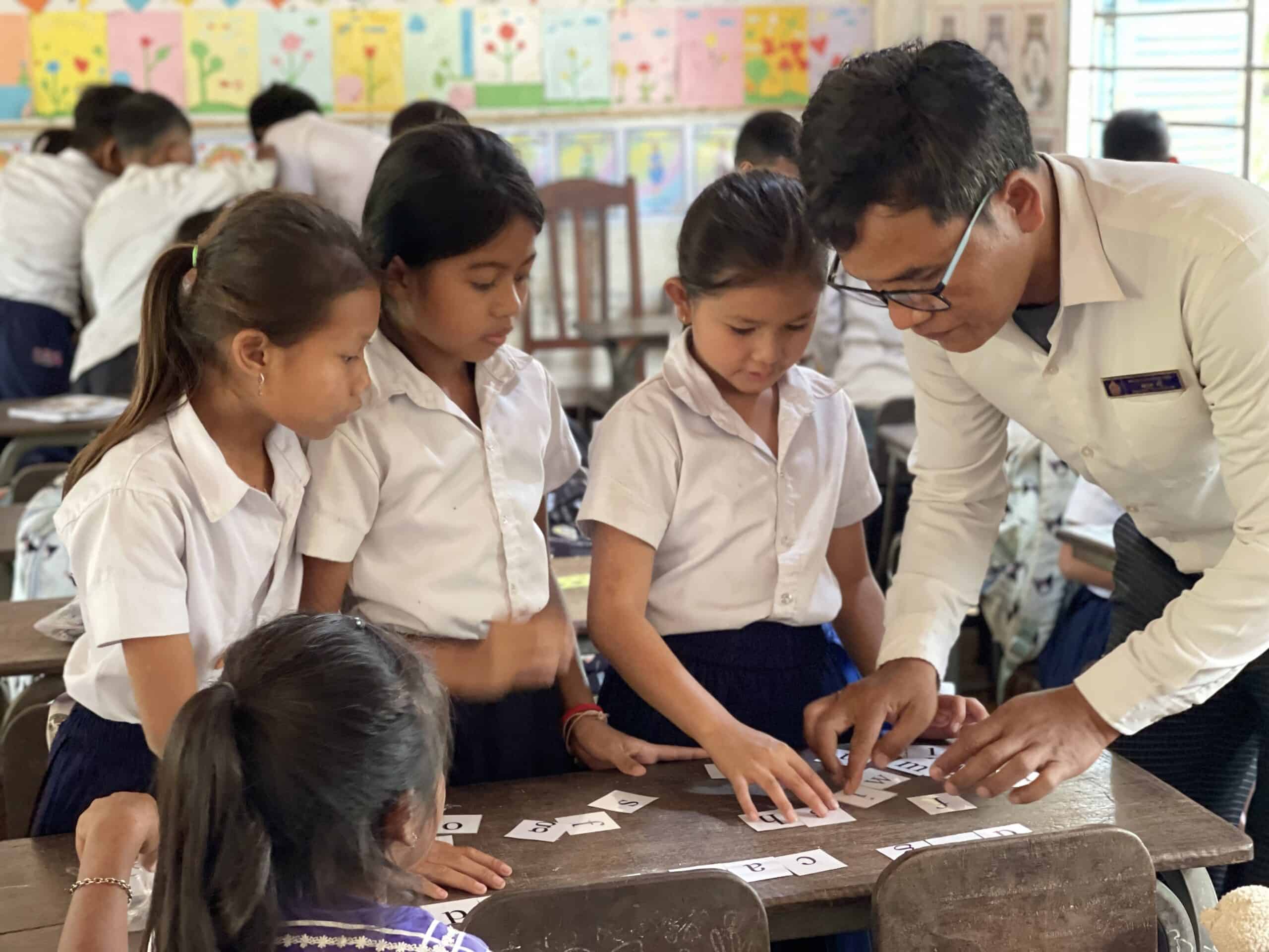 TDSO Teacher Training in Cambodia with students and instructor.